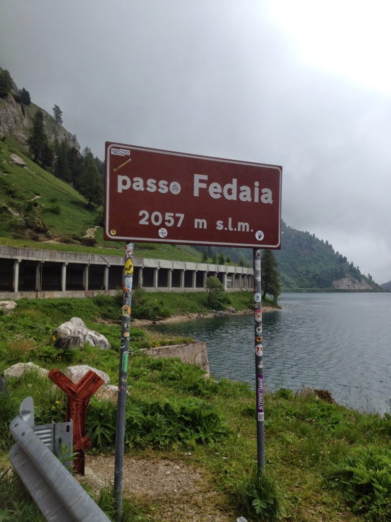 Lake and snow shed at passo Fedia